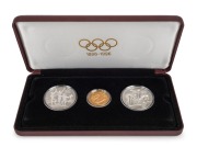 1896-1996 Olympic Centennial Coin Programme - Series II - Participation, Friendship & Fair Play. 1993 cased proof set of 3 comprising of gold $200 Gymnast, silver $20 The Relay Team and $20&nbsp;The Champions. With the 3 certificates of authenticity.