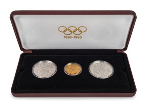 AUSTRIA: 1896-1996 Olympic Centennial Coin Programme - Series 4. 1995 cased proof set of 3 comprising of gold 1,000sch Zeus, silver 200sch Gymnast and 200sch Slalom Skier. With the 3 certificates of authenticity.