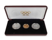 France: 1896-1996 Olympic Centennial Coin Programme - Series 3. 1994 cased proof set of 3 comprising of gold 500Fr The Archer, silver 100Fr The Javelin Thrower and silver 100Fr The Discus Thrower. With the 3 certificates of authenticity.