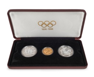 1896-1996 Olympic Centennial Coin Programme - Series II - Participation, Friendship & Fair Play. 1993 cased proof set of 3 comprising of gold $200 Gymnast, silver $20 The Relay Team and $20 The Champions. With the 3 certificates of authenticity.