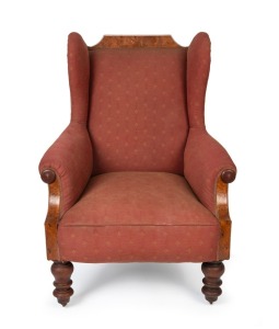 A Colonial Australian huon pine wing back library chair, baluster turned front legs, later upholstery, circa 1865, 107cm high, 78cm across the arms