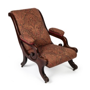 WILLIAM STANWAY&nbsp;antique Australian cedar scroll arm lay back easy chair, front legs with decorative lamb tongue scroll decoration terminating in brass castors, newly upholstered in paisley style fabric, Melbourne origin, circa 1865, A near identical examp