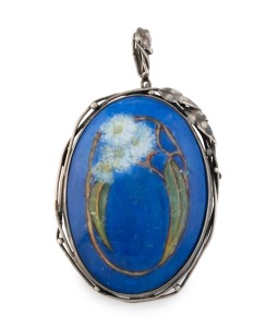 RHODA WAGER silver mounted pendant hand-painted by ADA NEWMAN with gum leaves and blossoms on blue ground, silver mount stamped "WAGER", porcelain panel signed verso "A. Newman", 6.5cm high&nbsp;overall.