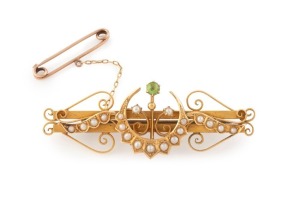 DUGGIN, SHAPPERE & Co. of Melbourne antique 15ct gold, seed pearl and peridot brooch, 19th/20th century, stamped "15" flanked by pictorial marks, 5.4cm wide, 7.1 grams.