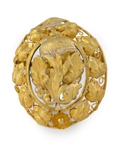 A fine quality Colonial Australian 15ct gold oval brooch with leaf decoration and mourning window back, Sydney origin, circa 1860, 5.3cm high,13.2 grams gold weight not including glass.
