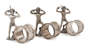Three antique Australian silver plated napkin rings with Aboriginal hunting figures, made by STEWART DAWSON & Co. 19th/20th century, 10cm high.
