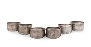 HENRY STEINER set of six antique Australian silver napkin rings with engraved decoration and swan crests, each one numbered 1 to 6, South Australian origin, 19th century, 184 grams total.