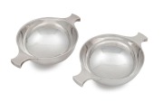WILLIAM DRUMMOND & Co. of Melbourne, pair of Australian silver quaichs, early 20th century, stamped "STG. SIL. WM. DRUMMOND & Co. Melbourne", 5cm high, 17cm wide, 282 grams total.