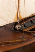 A scratch built model couta boat, on timber stand, 135cm high overall, 101cm long - 5