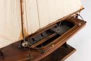 A scratch built model couta boat, on timber stand, 135cm high overall, 101cm long - 7
