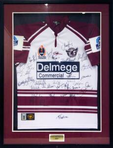 MANLY SEA EAGLES: Manly Warringah jersey signed by 2004 team, with c34 signatures, framed & glazed, overall 85x106cm.