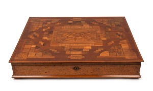 H. C. OSBORNE of Auckland, impressive antique New Zealand specimen wood presentation case, adorned with marquetry panel surrounded by parquetry decoration, interior fitted with plush yellow velvet and satin sash, with original lock and key, 19th/20th cent