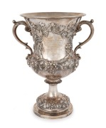 KILPATRICK & Co. MELBOURNE. An antique sterling silver two handled cup with repousee grape decoration engraved "Presented To CAP.tn. EDWARD A. REYNELL, By The Passengers Of The Ship TRUE BRITTON,&nbsp;As A Slight Mark Of Their High Appreciation Of His Constant