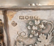 KILPATRICK & Co. MELBOURNE. An antique sterling silver two handled cup with repousee grape decoration engraved "Presented To CAP.tn. EDWARD A. REYNELL, By The Passengers Of The Ship TRUE BRITTON,&nbsp;As A Slight Mark Of Their High Appreciation Of His Constant - 2