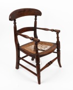 An antique English elm and beech child's cottage chair with spadeback and rush seat (damaged), early 19th century, 57cm high, 33cm across the arms
