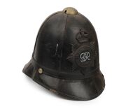 An Australian police "Bobby" helmet with George V hat plate, bearing original paper label&nbsp;"A.W. SUDWEEKS&nbsp;MANUFACTURER, BALLARAT", circa 1910.