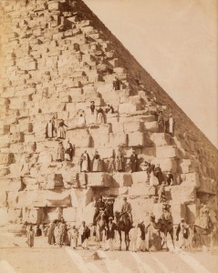ALBUMEN PAPER PRINTS: Various images including an Egyptian Grand Tour image depicting European visitors and their Egyptian guides on a pyramid; actors on stage; Masonic groups; a fancy dress group at Nowgong (India) 1882; a young Aboriginal male; plus several others. Mixed sizes. (11, incl. non-albumen paper types).