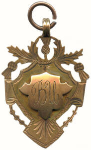 FOOTBALL MEDAL, Many Peaks Rugby Union (Brisbane), 15ct gold fob/medal with initials "BU" & thistles on front, engraved on reverse "Pres. by J.Ganter, to B.Ullman, Most Improved Forward, M.P.R.U., 1914". Weight 4.62 grams.