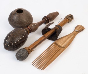 Four tribal artefacts including a carved coconut shell, bamboo hair comb, coconut dance wand and homemade cosh with lead weighted end, Papua New Guinea and others, the largest 32cm long