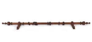 An antique Australian huon pine curtain rod with turned finials; together with an unrelated pair of antique Tasmanian huon pine curtain rod holders, 19th century, 237cm long