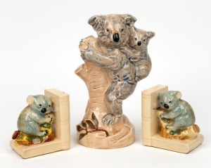 355 · ELISCHER pottery koala figural group, together with a pair of ceramic koala bookends, (3 items), the statue 23cm high