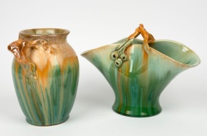REMUED green and brown glazed pottery basket vase with rare gum leaf and gumnut decoration front and back; together with a branch handled vase with green and brown glaze, (2 items), both incised "Remued", 19cm high each