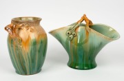 REMUED&nbsp;green and brown glazed pottery basket vase with rare gum leaf and gumnut decoration front and back; together with a branch handled vase with green and brown glaze, (2 items), both incised "Remued", 19cm high each
