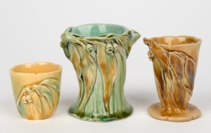 ERIC BRYCE CARTER three pottery vases with applied gumnuts and leaves, all with incised signature, the largest 9cm high