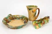 Pottery jug, bowl and dish, all with applied decoration, (3 items), signed "E. Powis", "V. E. Power, 30th October 1951" and "J. J. D.", the jug 15cm high