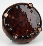HARVEY SCHOOL brown glazed segmented pottery dish with applied gumnuts; together with a brown glazed pottery bowl with applied lizarrd decoration, signed "K. Dallas, R. G. H., '67" and a brown glazed pottery bowl with applied gum leaf decoration, (3 items - 4