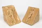 ARTIST UNKNOWN unusual pair of triangular pottery bookends with male and female nude decoration, both signed "Fran", 9cm and 10cm high