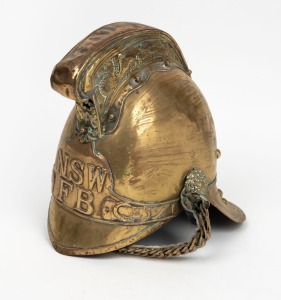 N.S.W. FIRE BRIGADE antique brass helmet with original chin strap and black leather lining, 19th century,