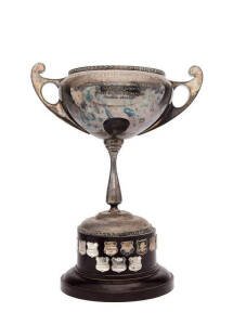 'HERALD CUP' TROPHY, presented by  The Sydney Morning Herald for the Best and Fairest Player, State Soccer Premiership", silver-plated trophy on bakelite base, 45cm tall, with shields on base engraved with the names of the winners 1955-74. Silver worn, th