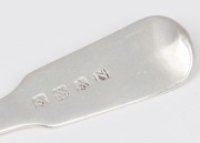 An antique fiddle pattern silver dessert spoon, most likely Australian, mid 19th century, stamped "A", "S.S.", "A", and "N", ​​​​​​​17cm long, 52 grams. - 2