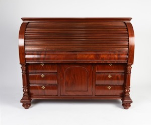 An antique Australian cedar tambour cylinder roll-top desk, 19th century, fully restored and re-polished, ​​​​​​​116cm high, 144cm wide, 64cm deep (when closed)