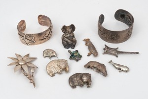 Australian silver bangles and brooches adorned with fauna and flora, 20th century, (12 items)
