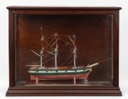 A scratch built model boat in original cedar case, 19th/20th century, ​​​​​​​36cm high, 45cm wide, 15cm deep