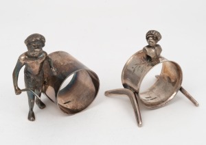 73 · Two antique Australian silver plated napkin rings with Aboriginal hunting figures, and Aboriginal bust finial, one stamped "STEWART DAWSON & Co., the other retailed by SIMONSEN of Melbourne, 19th/20th century, the larger 8cm high.