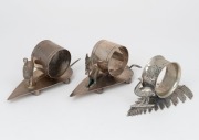 Three assorted antique silver plated napkin rings with gum leaf or fern bases, decorated with kangaroo and emus, 19th/20th century, the largest 6cm high, 12cm wide.