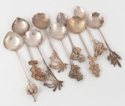 HARRIS & SON group of nine Australian silver spoons with wildflower decoration, each titled on the reverse, Western Australian origin, 20th century, the largest 13cm long, 120 grams total.