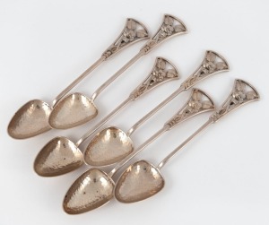 115 · JAMES LINTON set of six Australian silver teaspoons with donkey orchid decoration, Western Australian origin, 20th century, 11cm high, 75 grams total.
