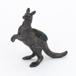 An antique silver plated kangaroo pin cushion with glass eyes, 19th century, 8cm high.