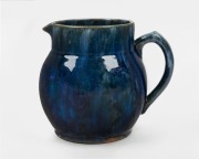 JOHN CAMPBELL blue glazed pottery jug, incised "John Campbell", 14.5cm high
