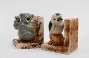 Two left-hand pottery bookends adorned with koalas and kookaburra, 13.5cm and 14cm high