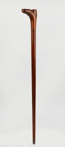 An antique Australian fiddleback blackwood walking stick with brass ferrule and carved boot grip, circa 1890, 89cm long