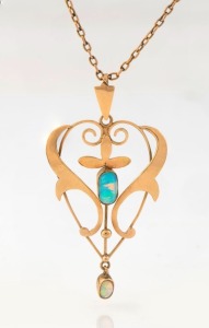 An antique Australian 9ct rose gold and solid polished opal negligee necklace, early 20th century, the pendant 4cm high, the chain 40cm long, 3.5 grams total