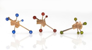 Three antique Australian Federation patriotic 9ct gold brooches with Australian maps a coloured stones, circa 1900, ​​​​​​​the largest 4.5cm wide, 10 grams total