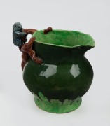 J. McLAREN green glazed hand-built pottery jug with applied branch handle and koala decoration, incised "J. McLaren, Hand Built, 8.", 16cm high