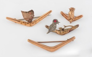 JOHNSON & SIMONSON&nbsp;of Melbourne antique Australian 9ct rose gold and red stone "COOEE" boomerang brooch with Tasmanian map, together with a WILLIS & SONS of Melbourne antique 9ct rose gold boomerang brooch, plus a 9ct rose gold kookaburra and boomerang br