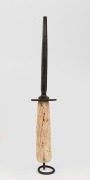 An antique sharpening steel with whalebone handle, 19th century, ​​​​​​​31cm long overall